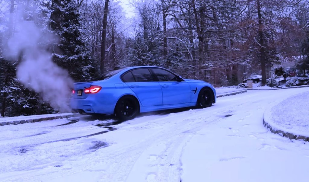 The moment a Tesla SUV pulls a BMW out of the snow - VIDEO thumbnail