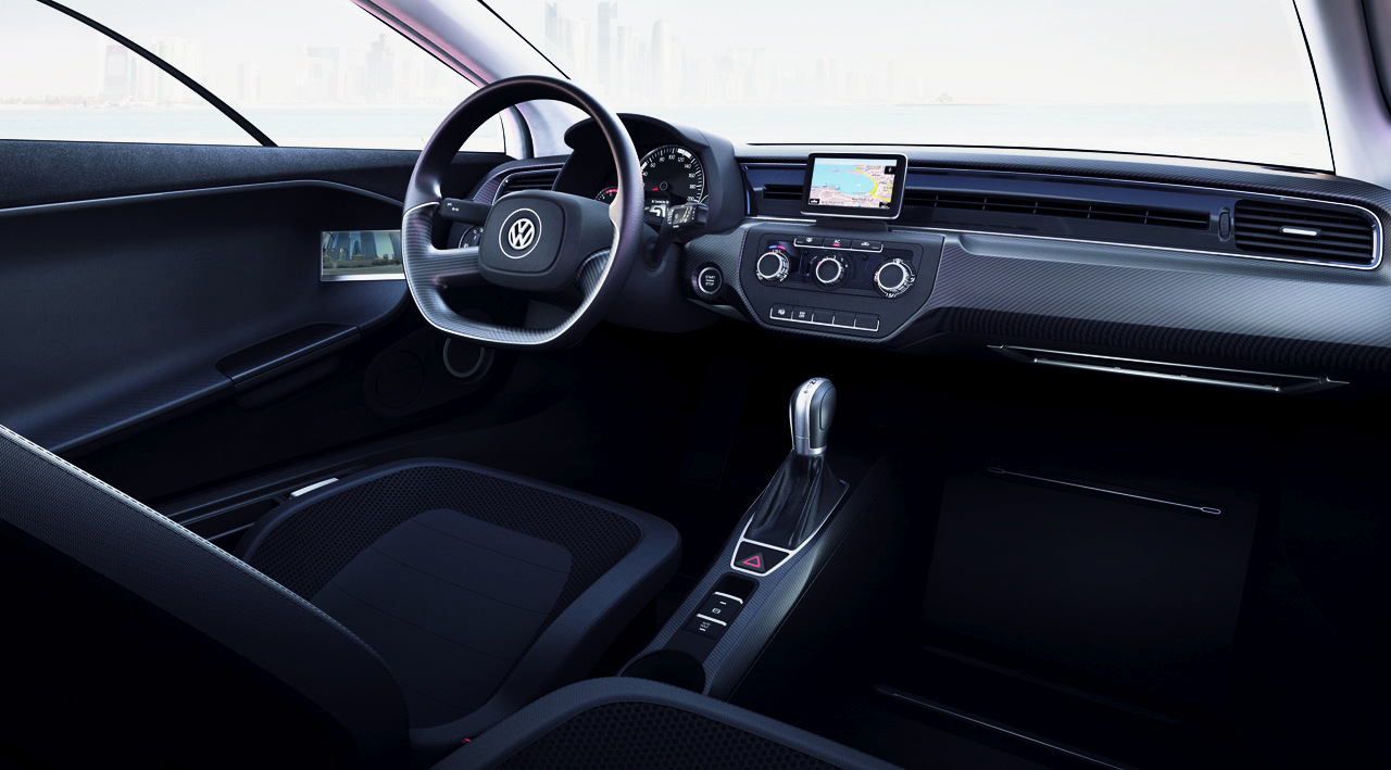 Interiorul lui Volkswagen XL1 are doua locuri alaturate si un layout specific unei masini actuale
